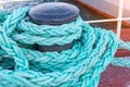 Green rope on the pier holds the ship Royalty Free Stock Photo