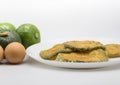 Green round log zucchini in baked or fried milanesas, Argentine gastronomy