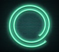 Green round neon luminous signboard on realistic bricklaying wal