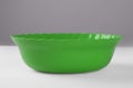 Green round plastic deep dish Royalty Free Stock Photo
