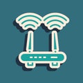 Green Router and wi-fi signal icon isolated on green background. Wireless ethernet modem router. Computer technology