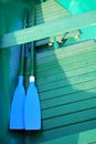 Green Rowboat with blue Oars Royalty Free Stock Photo