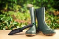 Green rubber boots for garden work Royalty Free Stock Photo