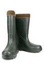 Green rubber boots with a warm toe on a white background Royalty Free Stock Photo