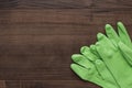 Green rubber cleaning gloves Royalty Free Stock Photo