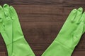 Green rubber cleaning gloves Royalty Free Stock Photo