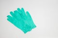 Green rubber glove isolated on white background Royalty Free Stock Photo