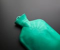 Green rubber hot water bottle Royalty Free Stock Photo