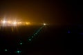 Green runway lights around an international airport Royalty Free Stock Photo