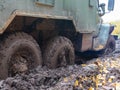 Green Russian Cargo Truck stuck in the mud. Soviet military truck URAL on the road Royalty Free Stock Photo