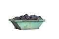 Green rusty container with black garbage bags Royalty Free Stock Photo