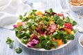 Green salad with blood oranges, carrots, beets, seeds and nuts