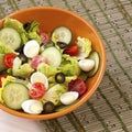 Green salad in bowl on table. Royalty Free Stock Photo