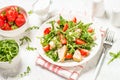 Green salad with chicken, strawberry and arugula. Royalty Free Stock Photo