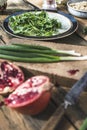 Green salad with pomegranate, manna croup, onion