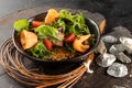 Green salad with salmon, mixed greens, tomatoes, quinoa and creamy capers dressing.