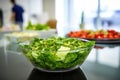 green salad served on a clean office cafeteria table