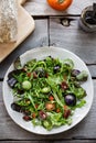 Green Salad with Green Tomatoes,Pecan and Goji berry Royalty Free Stock Photo