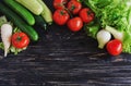 Green salad, tomatoes on vine, cucumbers, zucchini, squash, and Royalty Free Stock Photo