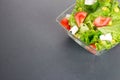Green salat on gray or dark background
