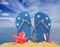 Green sandals and starfish in sand Royalty Free Stock Photo