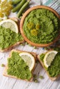 Green sandwiches with mashed peas close up. vertical top view Royalty Free Stock Photo