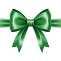 Green satin bow against a white Royalty Free Stock Photo
