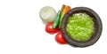 Traditional Mexican green sauce in molcajete, with copy space. Royalty Free Stock Photo