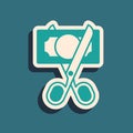 Green Scissors cutting money icon isolated on green background. Price, cost reduction or price reduction icon concept