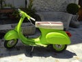 Green scooter at the entrance into Kalaja e Tiranes market.