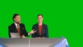 Green Screen Background: Live News Studio with Beautiful Female and Handsome Male Anchors Reportin Royalty Free Stock Photo