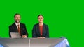 Green Screen Background: Live News Studio with Beautiful Female and Handsome Male Anchors Reportin Royalty Free Stock Photo