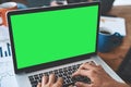 Green screen, copyspace and chromakey on a laptop of a business person typing an email, browsing the internet and