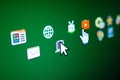 Green Screen Displaying App Icons with Mouse Cursor Pointing Towards App Interface Digital Computer and Internet Navigation on Royalty Free Stock Photo