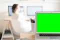 Green screen laptop computer and a glass with color pencils Royalty Free Stock Photo