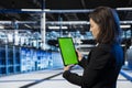 Green screen mockup tablet used by data center admin Royalty Free Stock Photo