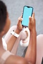 Green screen, phone and black woman on digital app for fitness, workout and gym tracking. Blank mobile mockup with a Royalty Free Stock Photo