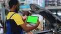 Green screen tablet car fix tutorial Royalty Free Stock Photo