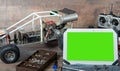 Green screen tablet with RC radio control car and tools Royalty Free Stock Photo