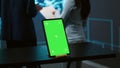 Green screen tablet used by computer scientists in AI startup