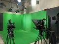 Green screen and teleprompter in studio