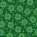 Green seamless background with shamrock