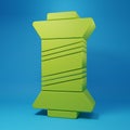 Green Sewing thread on spool icon isolated on blue background. Yarn spool. Thread bobbin. Minimalism concept. 3D render Royalty Free Stock Photo