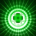 Green shamrock in circles with rays