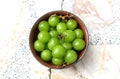 green shine muscat grape in cup isolate on a the stone table Royalty Free Stock Photo