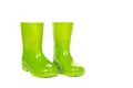 Green shiny child rain boots Royalty Free Stock Photo