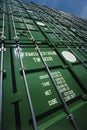 Green Shipping Containers stacked on one another