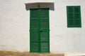 Green shuttered door & window