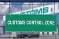 Green sign, customs control zone, on fence of logistic terminal. Royalty Free Stock Photo