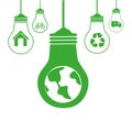 Green silhouette with bulb lights with recycling symbols